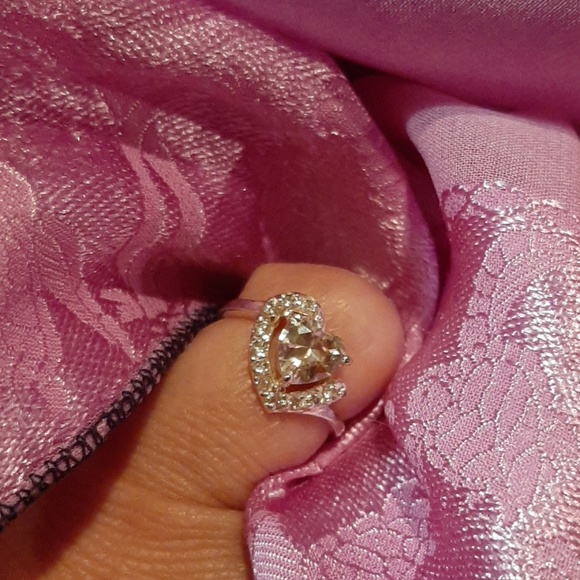 925 silver Jewelry - 4/$19   325 silver pink heart surrounded with CZ